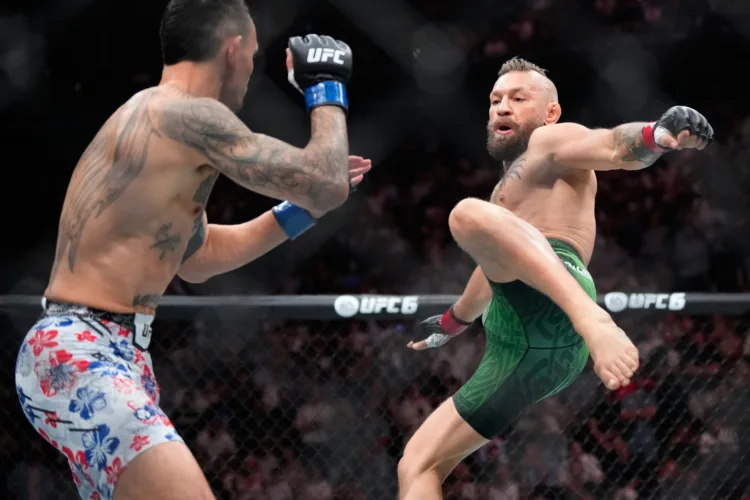 McGregor suffers early knee injury in return, loses to Max Holloway at UFC 329